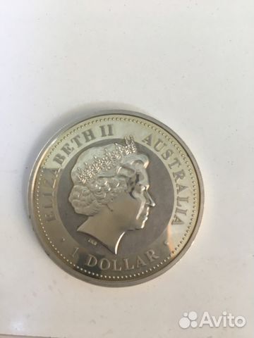 Монета серебряная