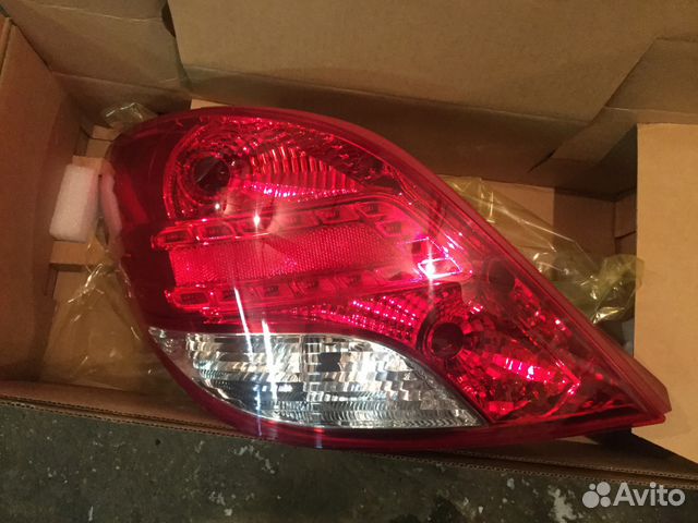 Фонарь Пежо 207 рестайлинг 2010-2015 год