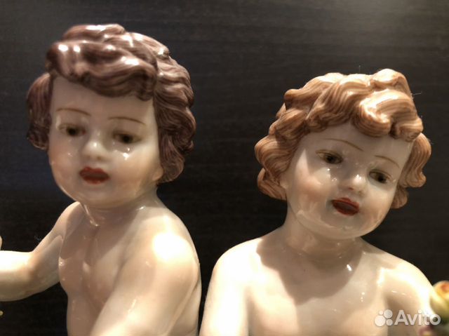 Фарфоровый подсвечник Putti Capodimonte Фарфоровый подсвечник Putti Capodimonte