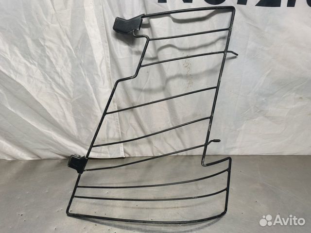 Решетка защитная левой фары Volvo FH