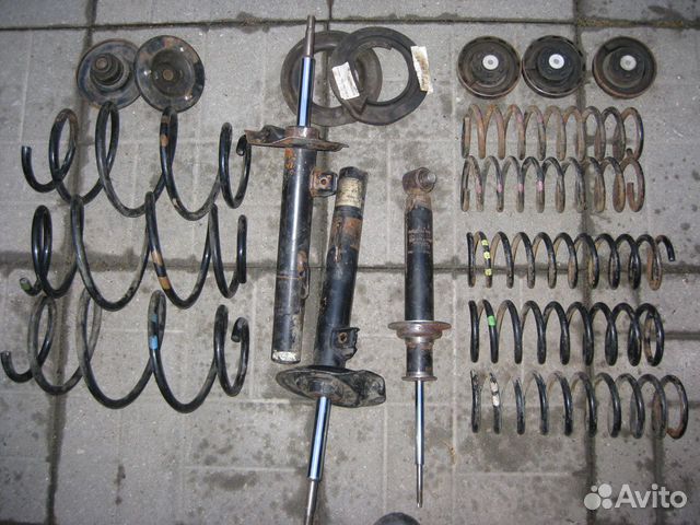 Стойки амортизаторов BMW E38 пружины опоры