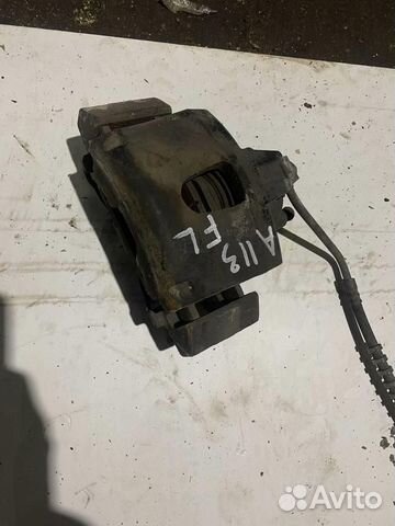 Суппорт передний левый dodge Grand Caravan 2001-2