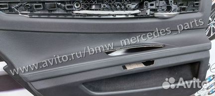 Обшивка двери BMW F02