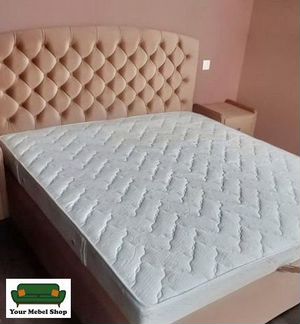 Кровать с мягким изголовьем