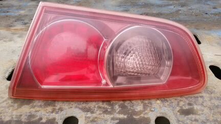 Фонарь задний правый в крышку багажника лансер 10