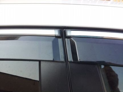 Дефлекторы Toyota Corolla нержавеющий молдинг